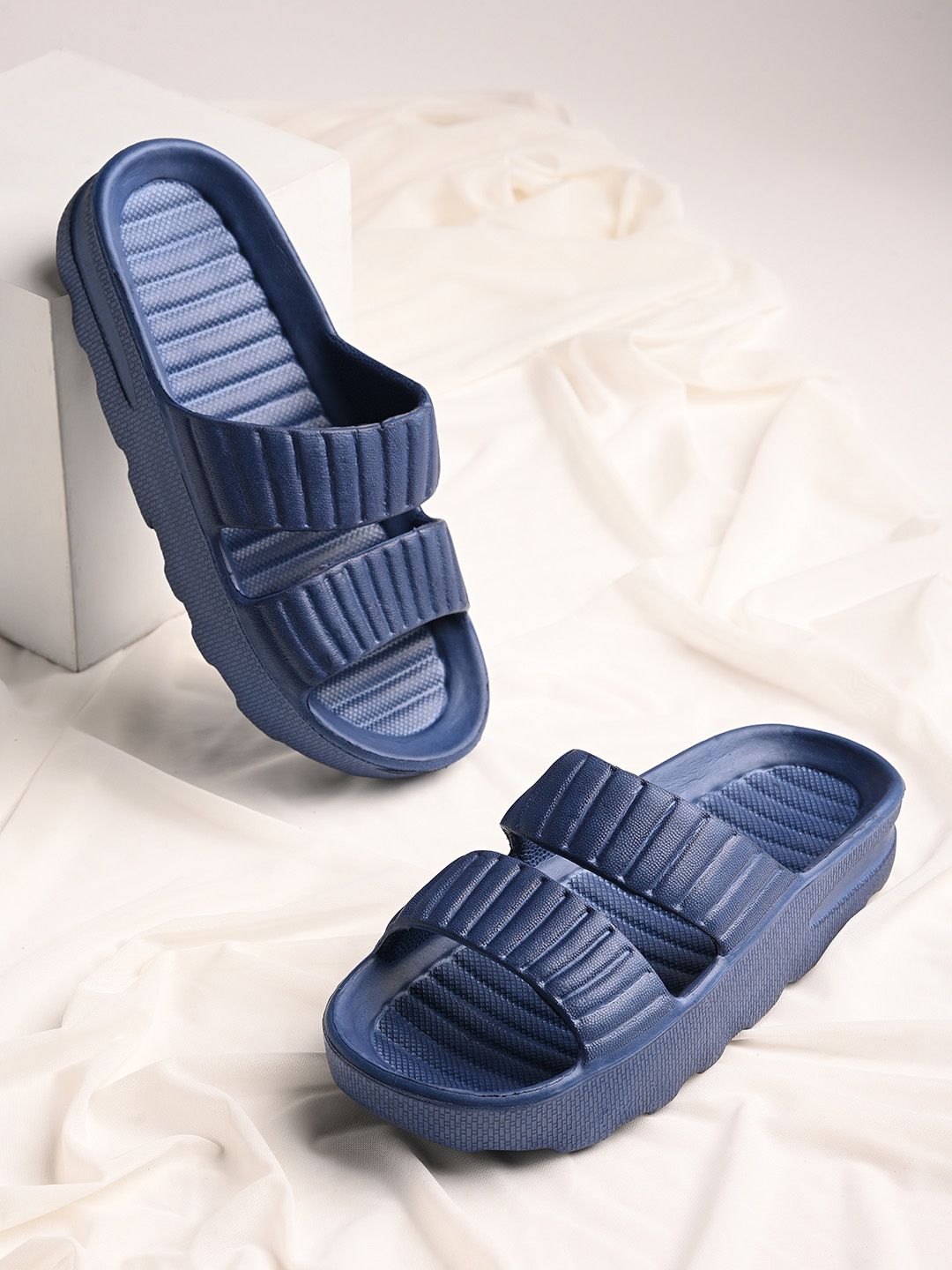 Shoetopia Women Blue Solid Synthetic Sliders Price in India