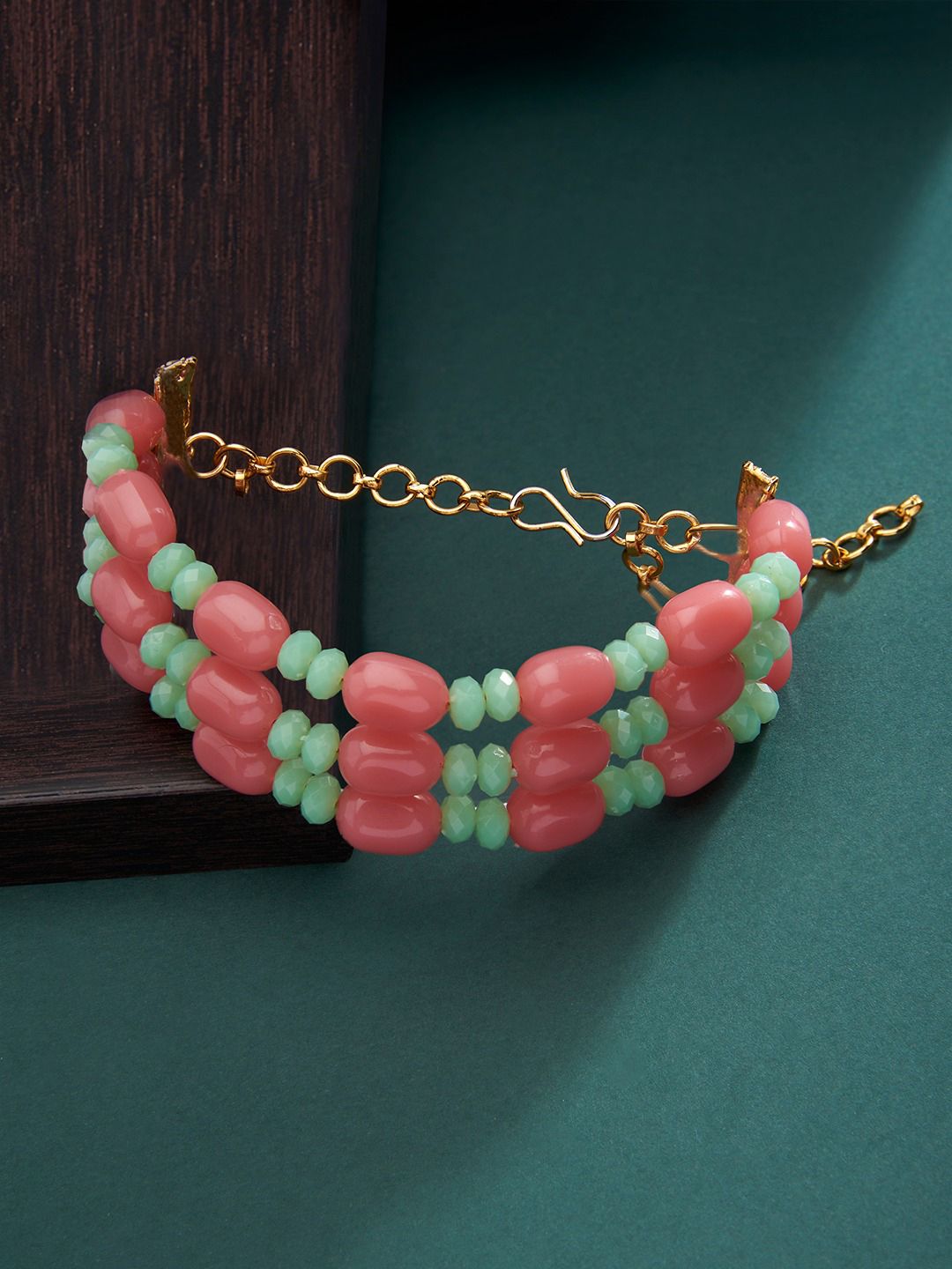 Zaveri Pearls Women Peach-Coloured & Green Gold-Plated Multistrand Bracelet Price in India