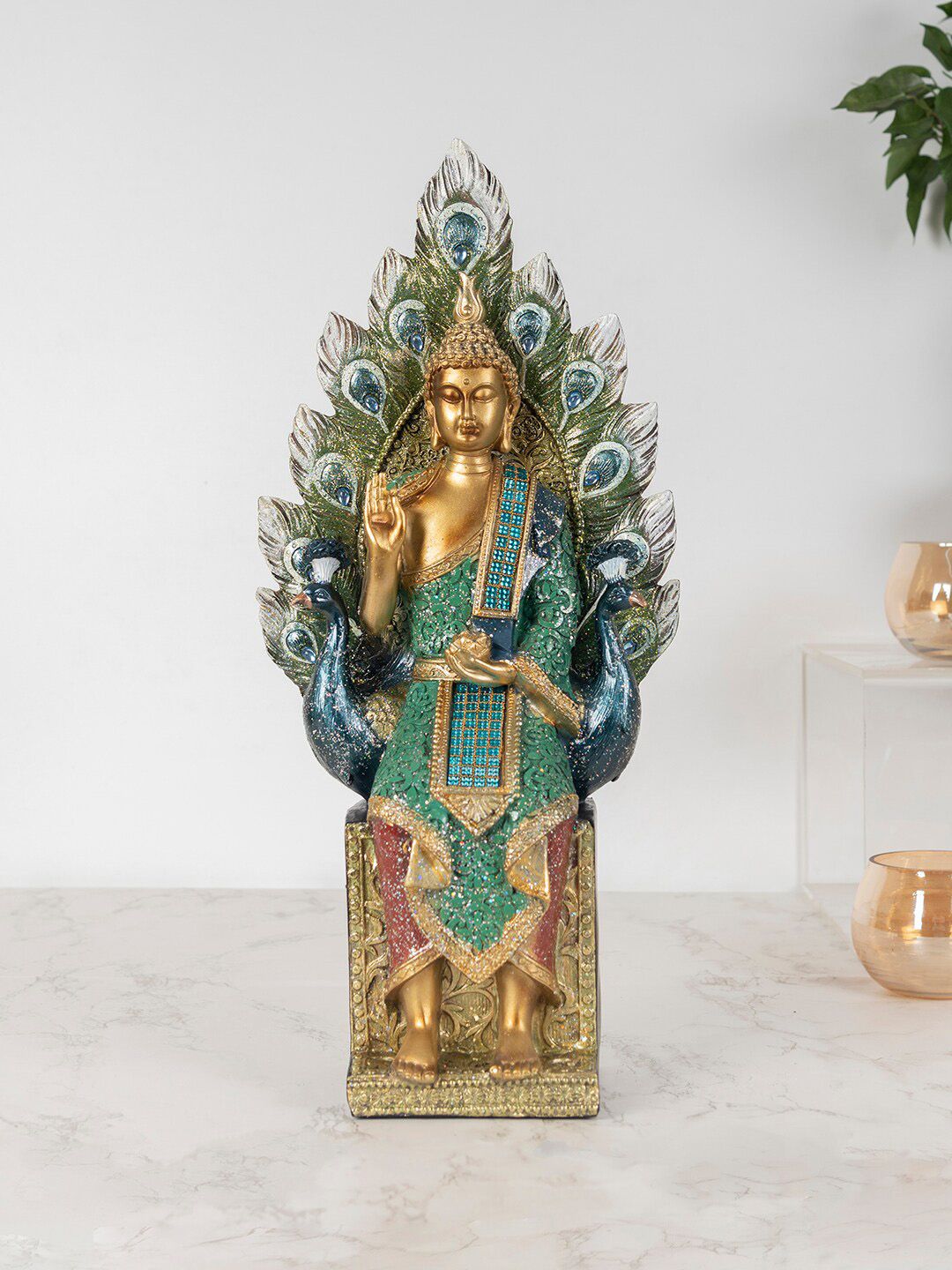 HomeTown Green & Gold Toned Hand Finished Zen Buddha On Peacock Throne Showpieces Price in India