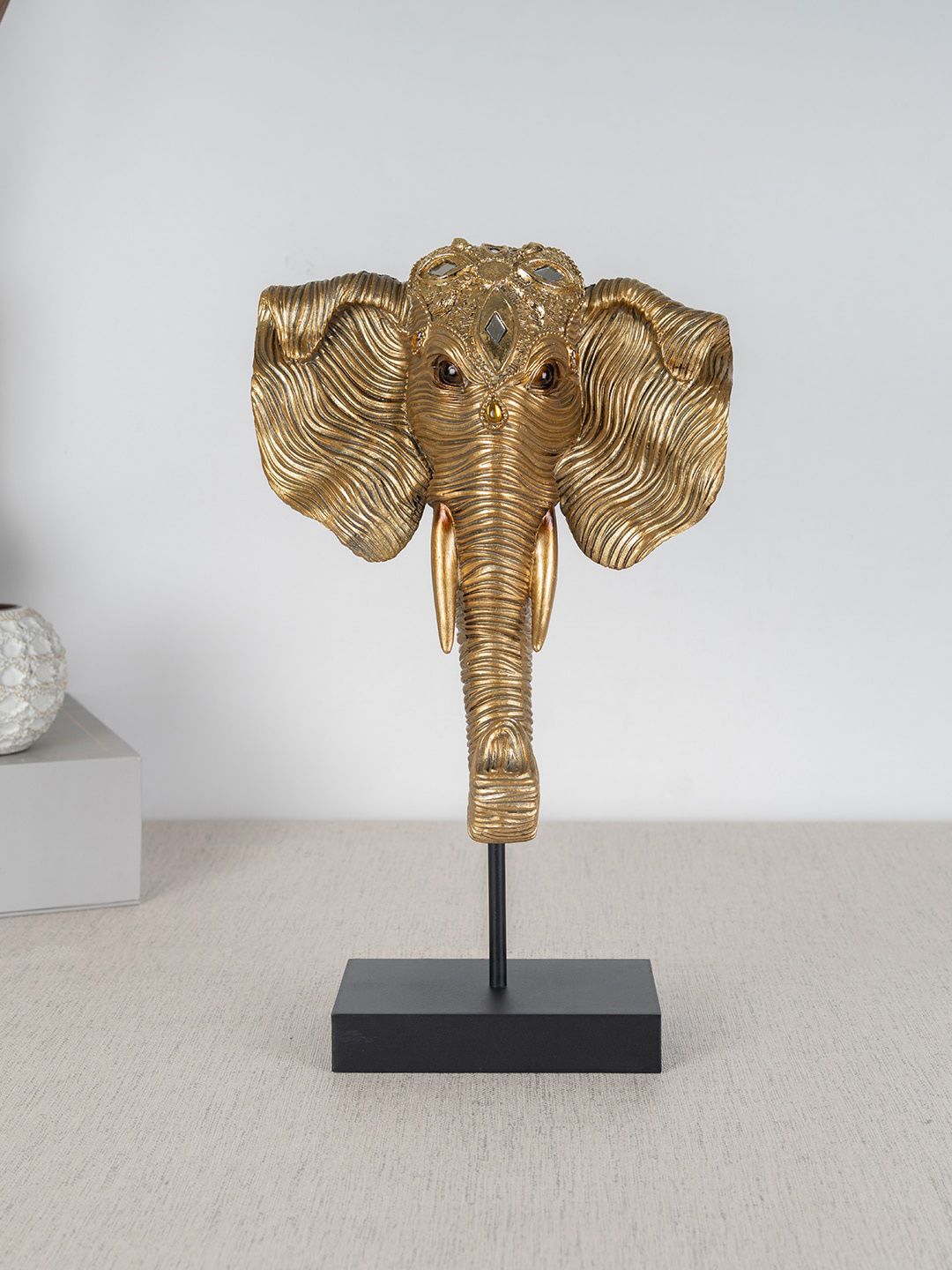 HomeTown Gold Miraya Elephant Head Polyresin Hand Finished Figurine Showpiece Price in India