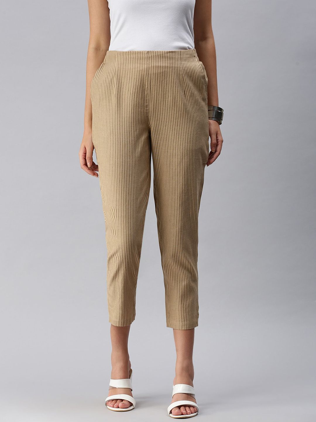De Moza Women Beige Striped Tapered Fit Cotton Trousers Price in India
