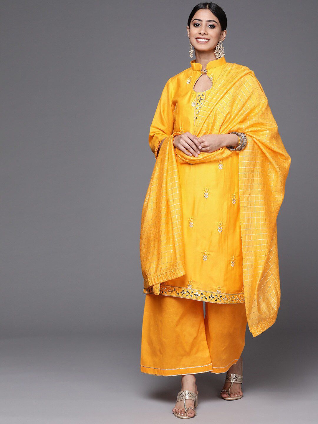 Chhabra 555 Women Yellow & Silver-Toned Embroidered Semi-Stitched Dress Material Price in India