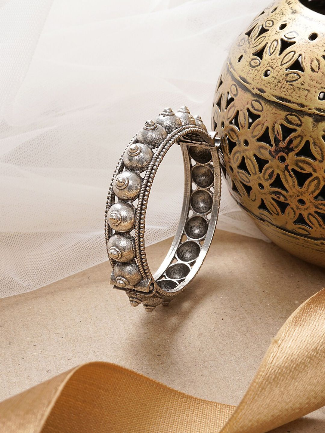 TEEJH Women Silver-Toned Brass Oxidised Kada Bracelet Price in India