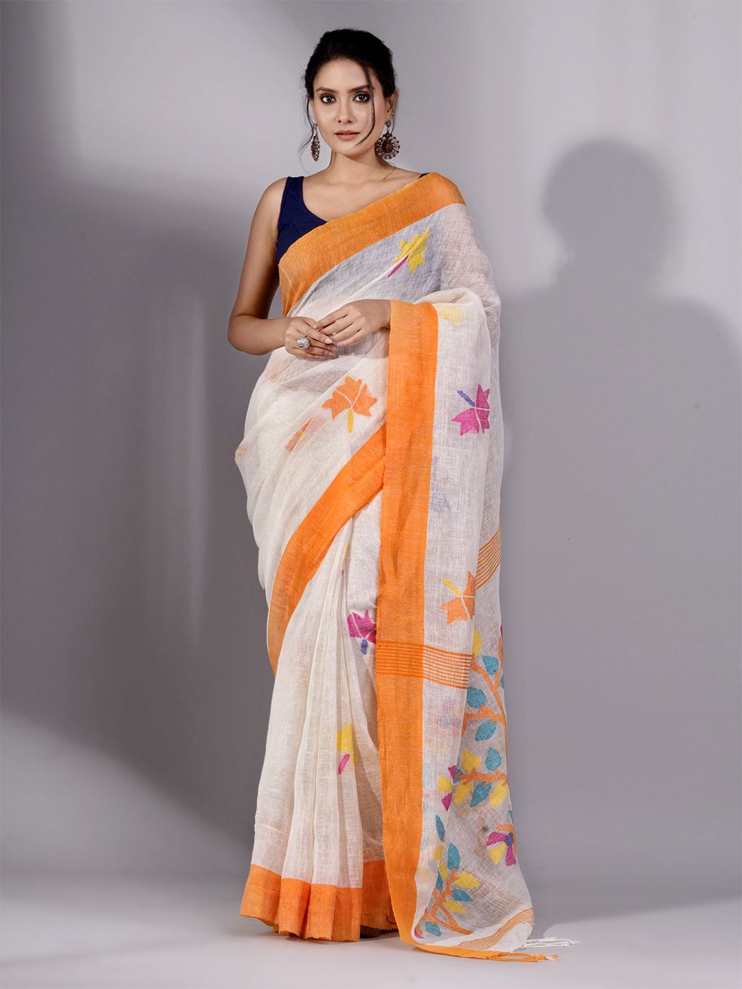 Charukriti Off White & Orange Woven Design Pure Linen Saree Price in India
