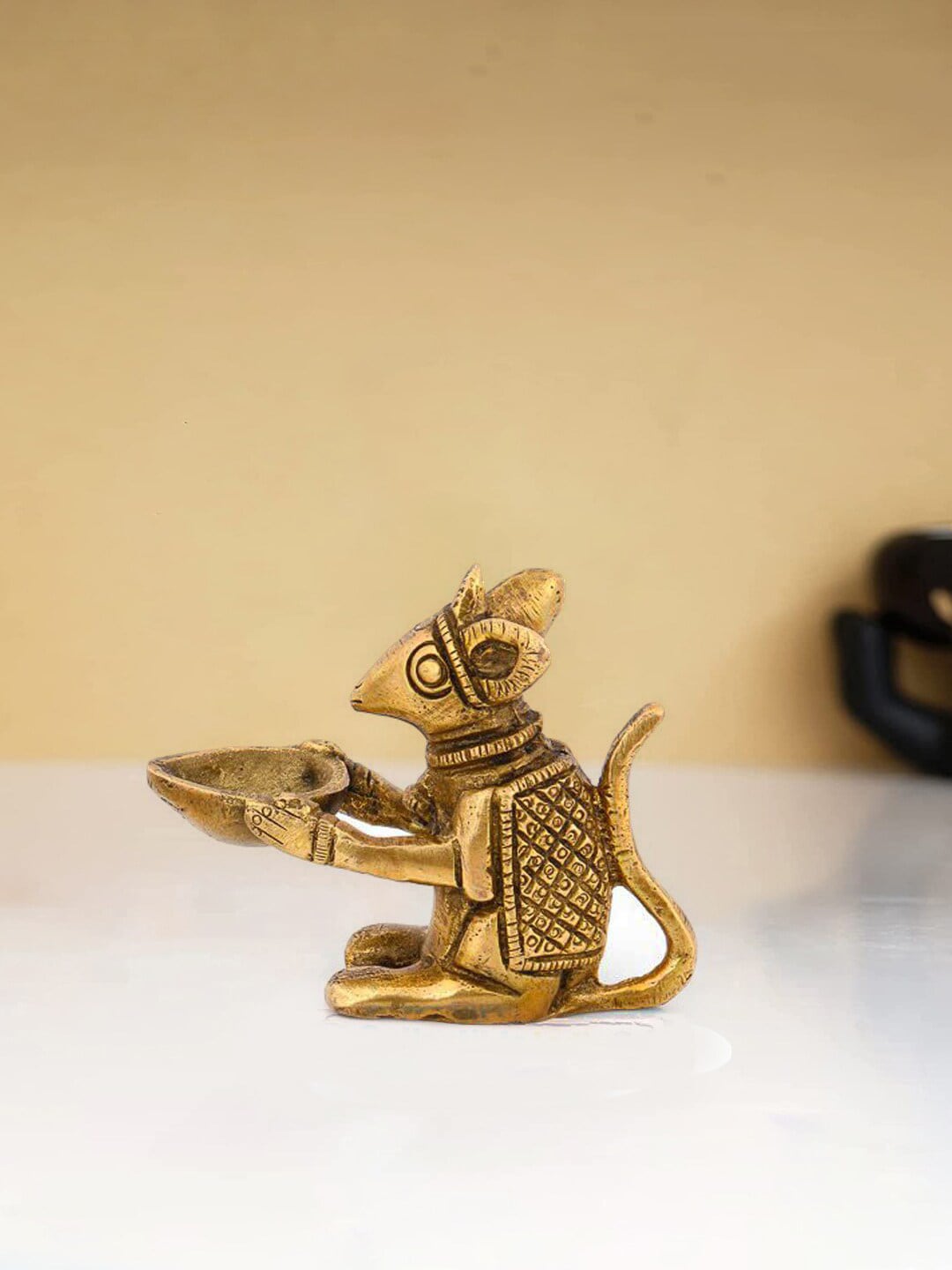 CraftVatika Gold Toned Brass Mouse Shaped Holding Diya Price in India