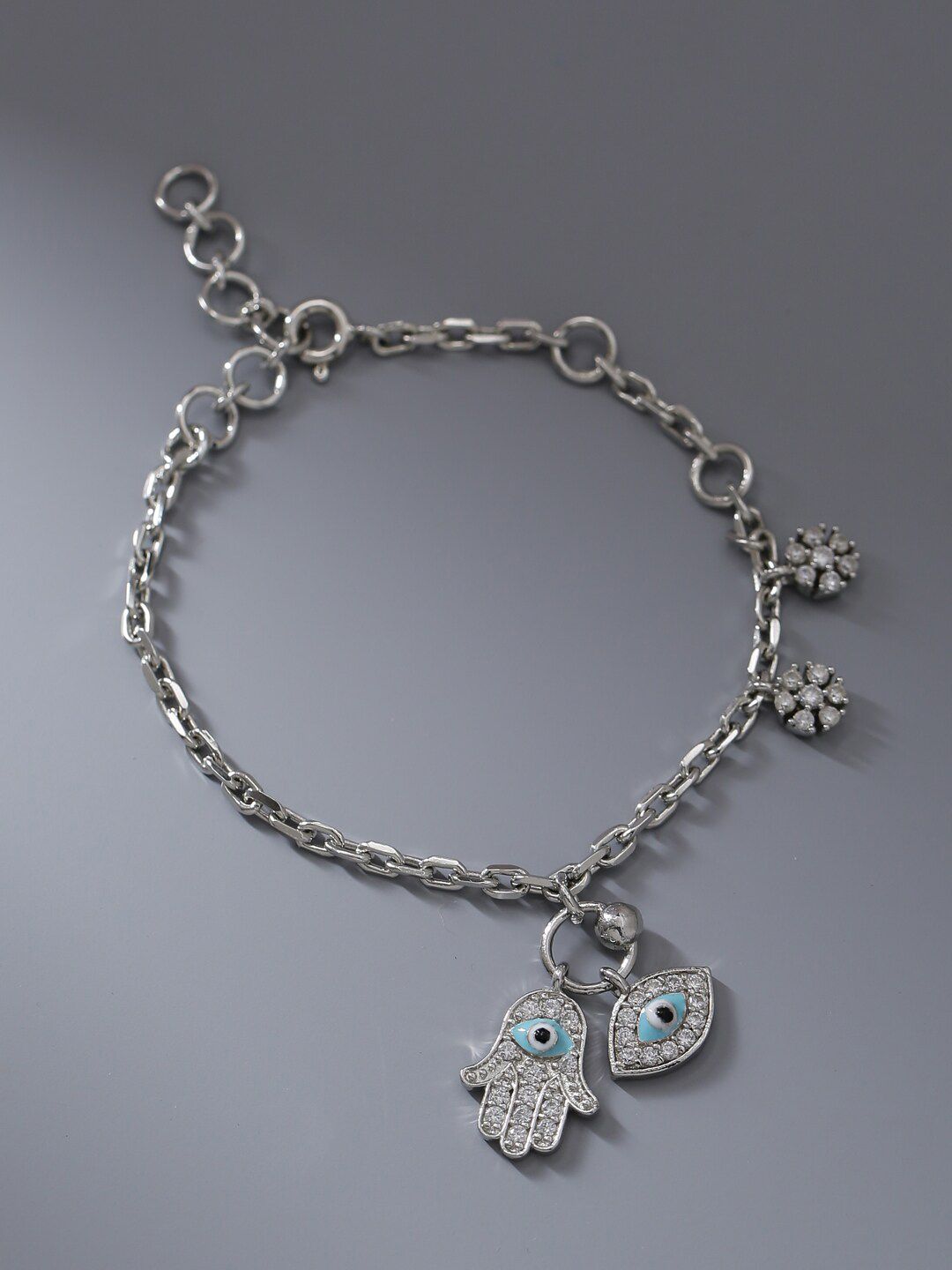 ADORN by Nikita Ladiwala Women Silver-Toned & Blue Sterling Silver Cubic Zirconia Handcrafted Link Bracelet Price in India