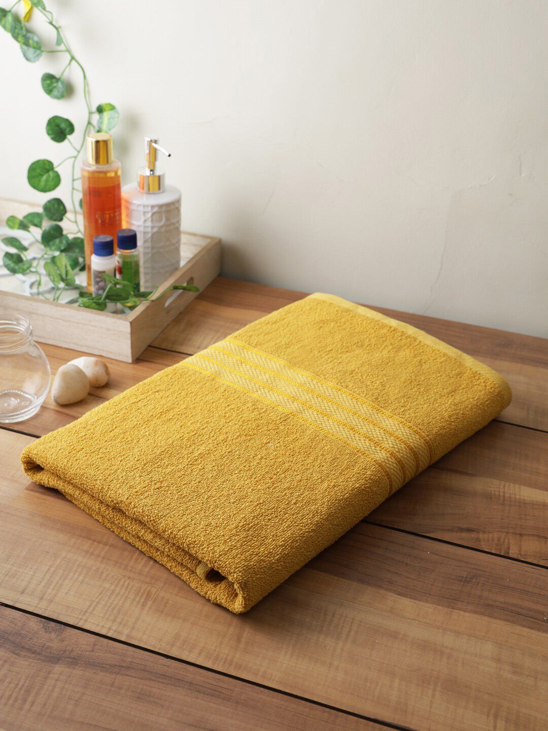 Softweave Unisex Yellow Solid 400 GSM Cotton Bath Towels Price in India