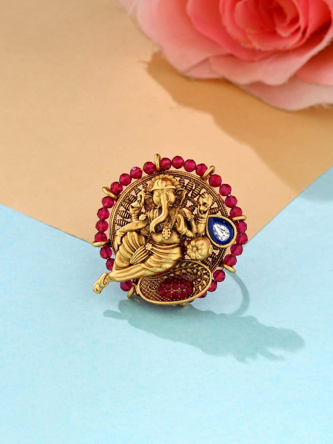 VIRAASI Gold-Plated Red Stone-Studded Lord Ganesha Engraved Adjustable Finger Ring Price in India