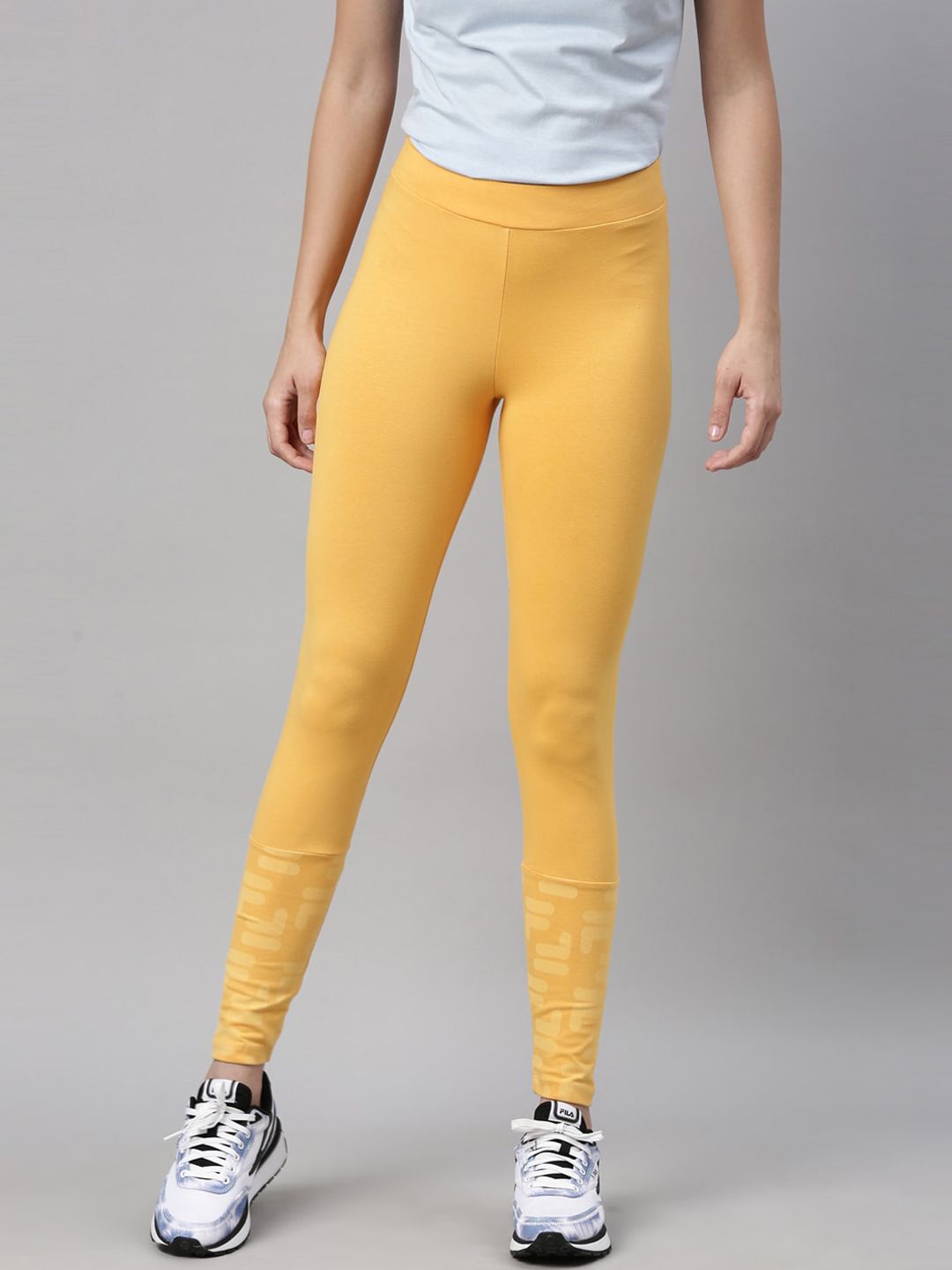 FILA Women Yellow Solid Tights Price in India