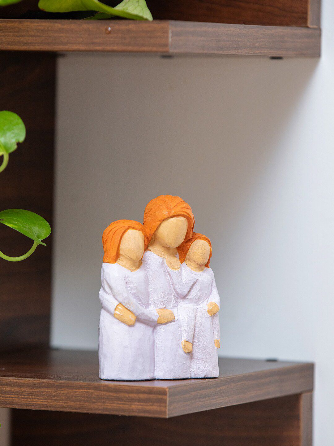 ExclusiveLane White & Orange Wooden Figurine Showpiece Price in India