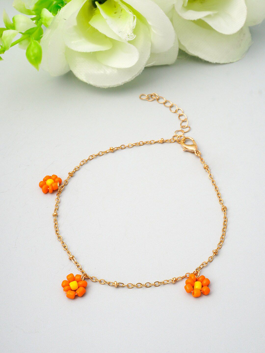 Ferosh Women Gold-Toned & Orange Charm Bracelet Price in India