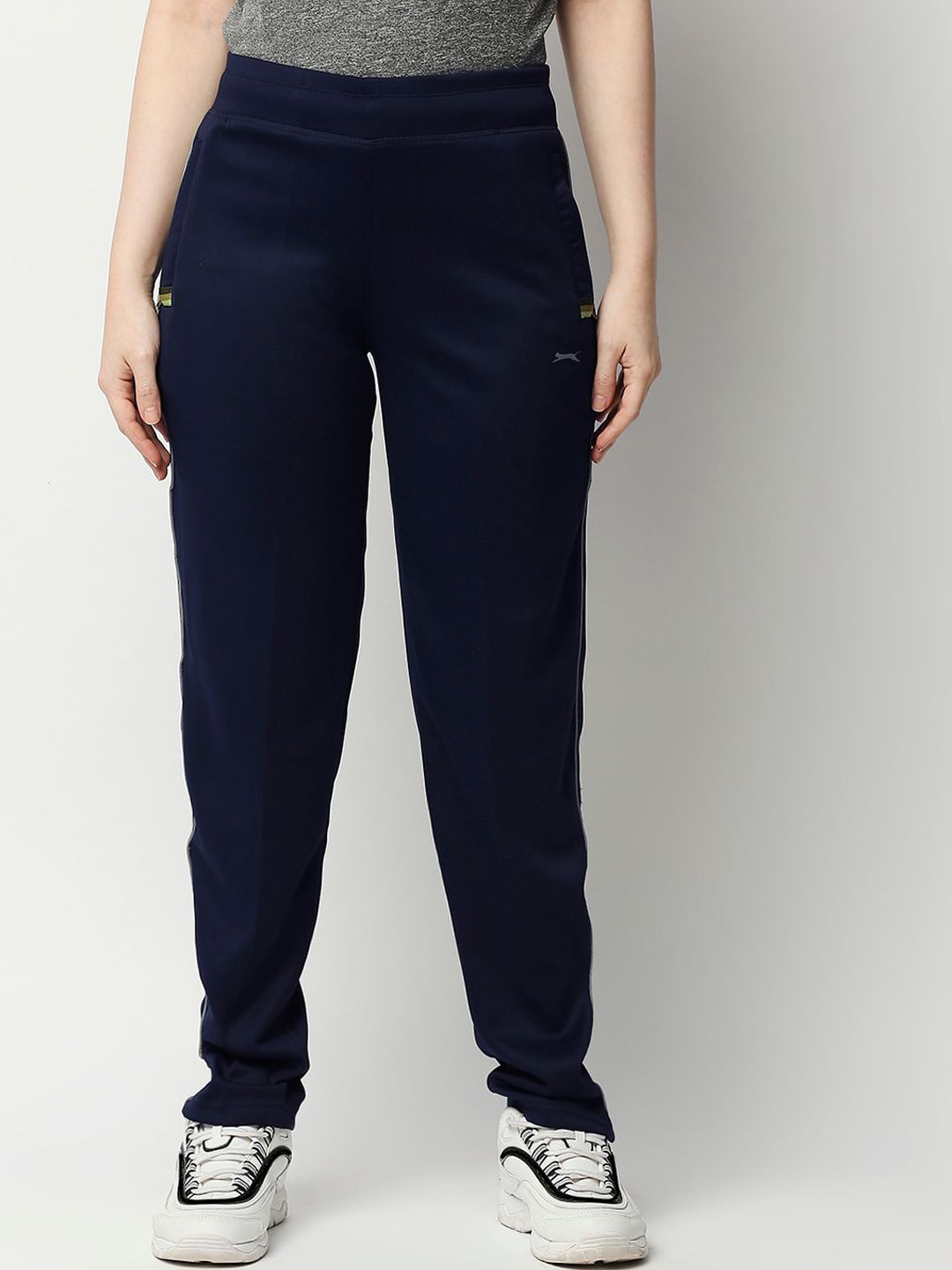 Black Panther Women Navy Blue Solid Track Pants Price in India