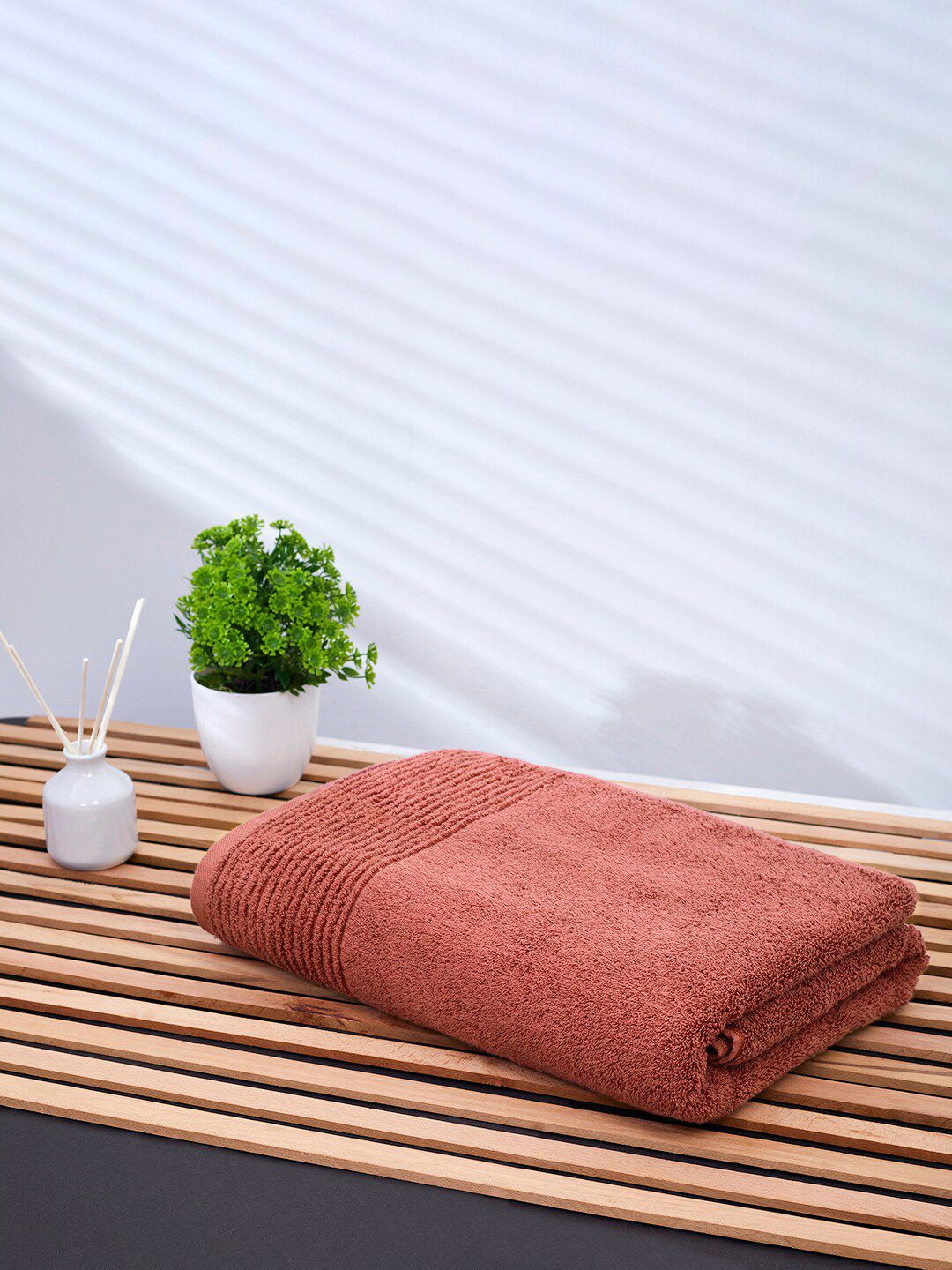 Himeya Orange Rust Solid 650 GSM Cotton Bath Towel Price in India