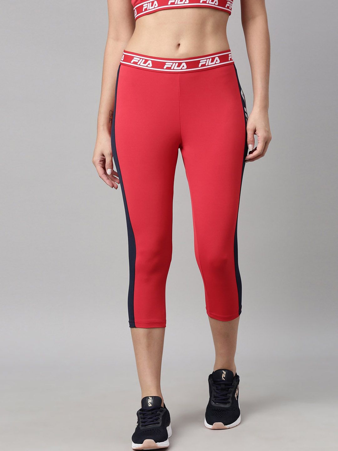 FILA Women Red Solid Three-Fourth Length Track Pants With Side Panel Price in India