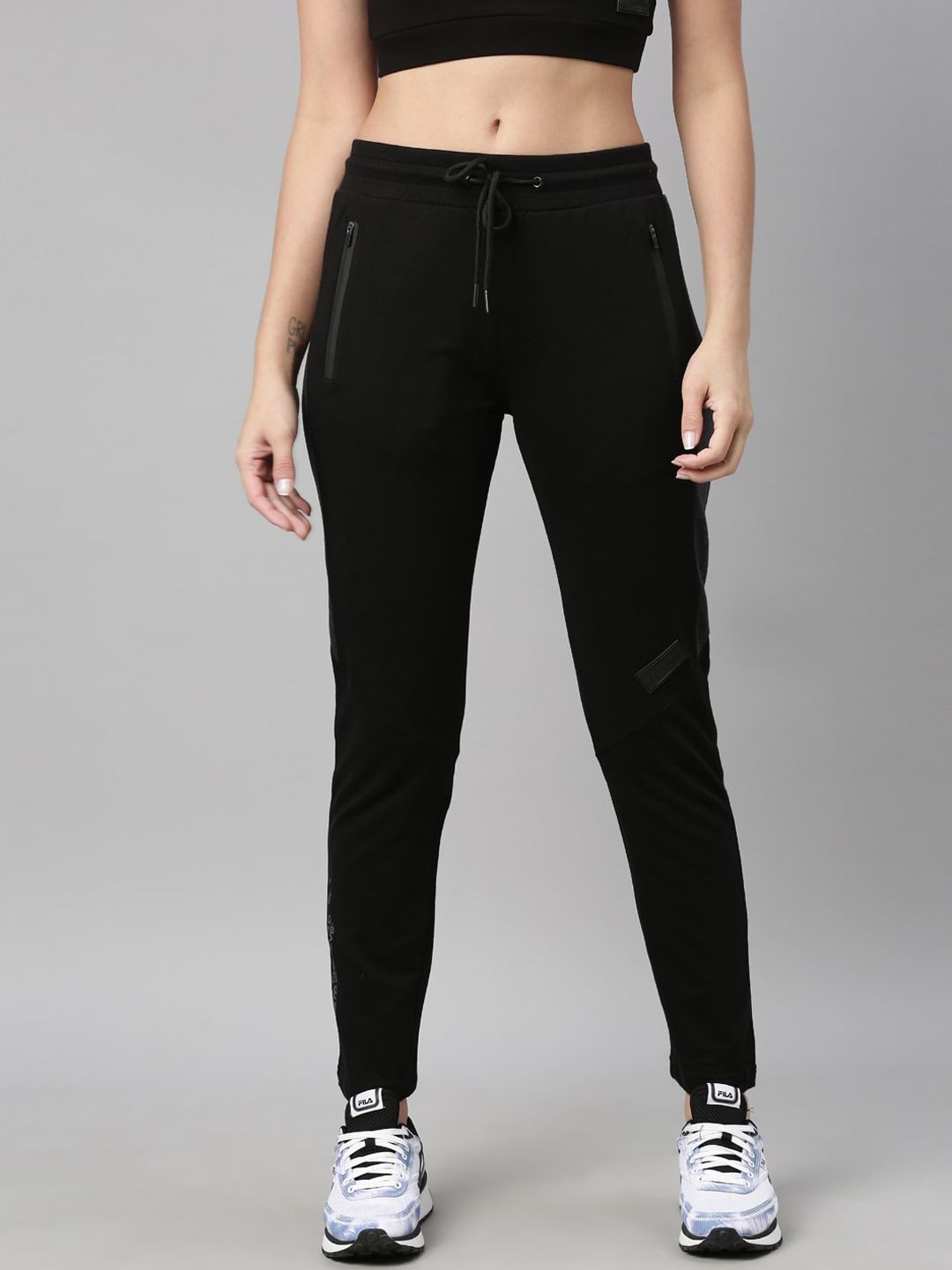 FILA Women Black Solid Cotton Track Pants Price in India
