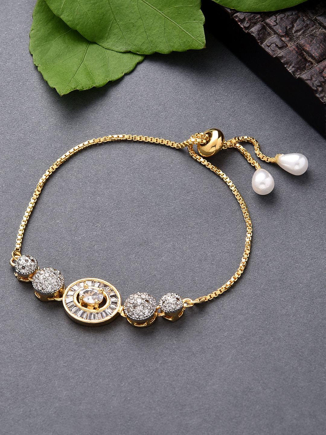 Fida Women Gold-Toned & White Brass American Diamond Gold-Plated Charm Bracelet Price in India