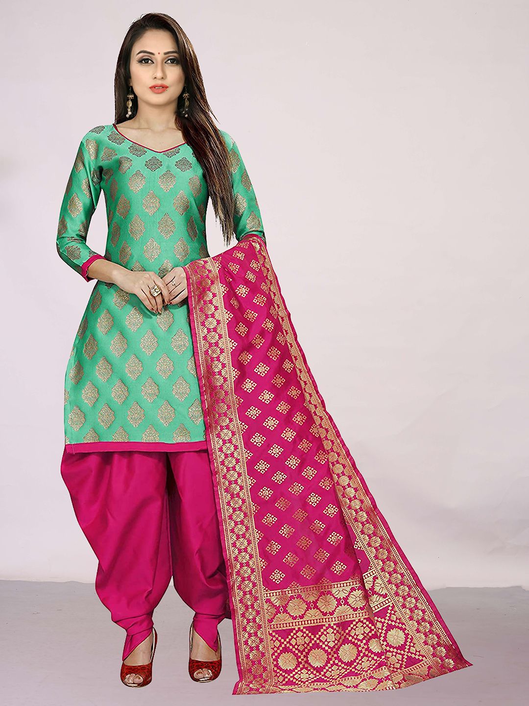 Ekta Textiles Sea Green & Pink Unstitched Dress Material Price in India