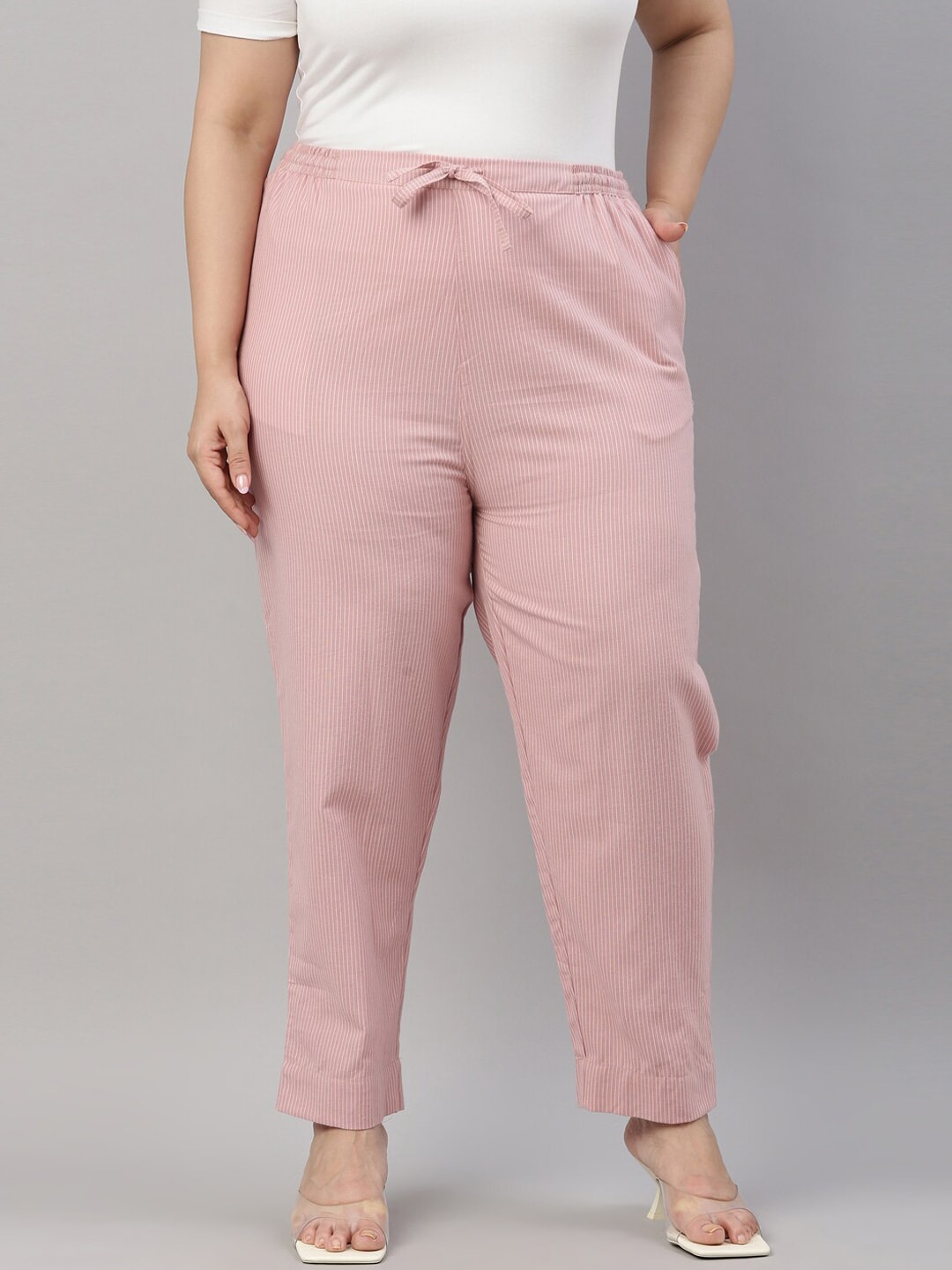 Go Colors Women Pink Printed Tapered Fit Trousers Price in India