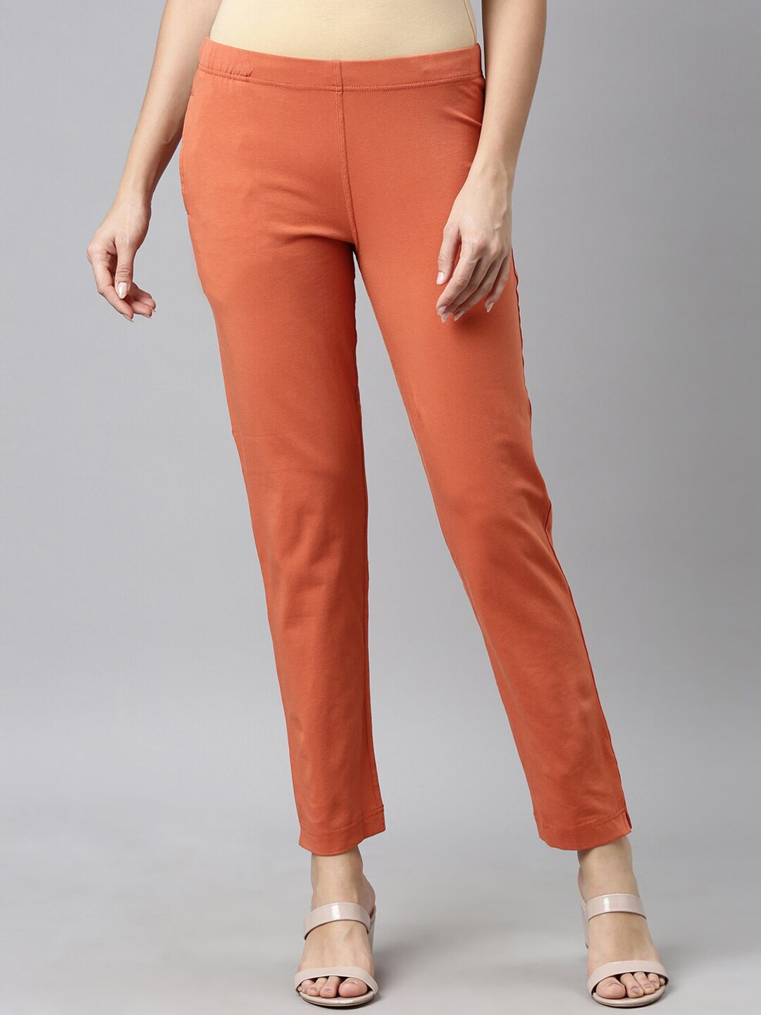 Go Colors Women Orange Chinos Trousers Price in India
