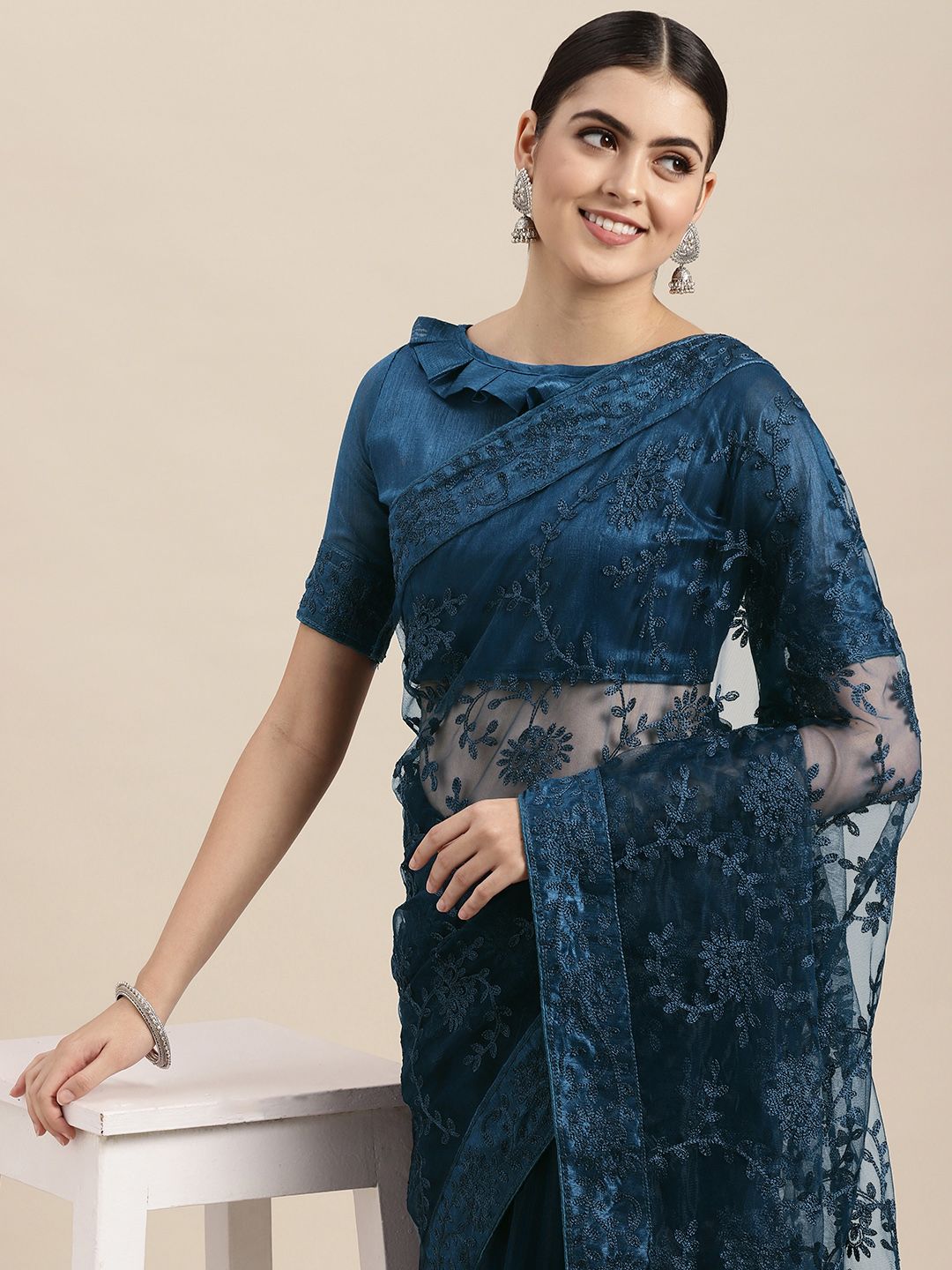 VAIRAGEE Teal Blue Floral Net Saree