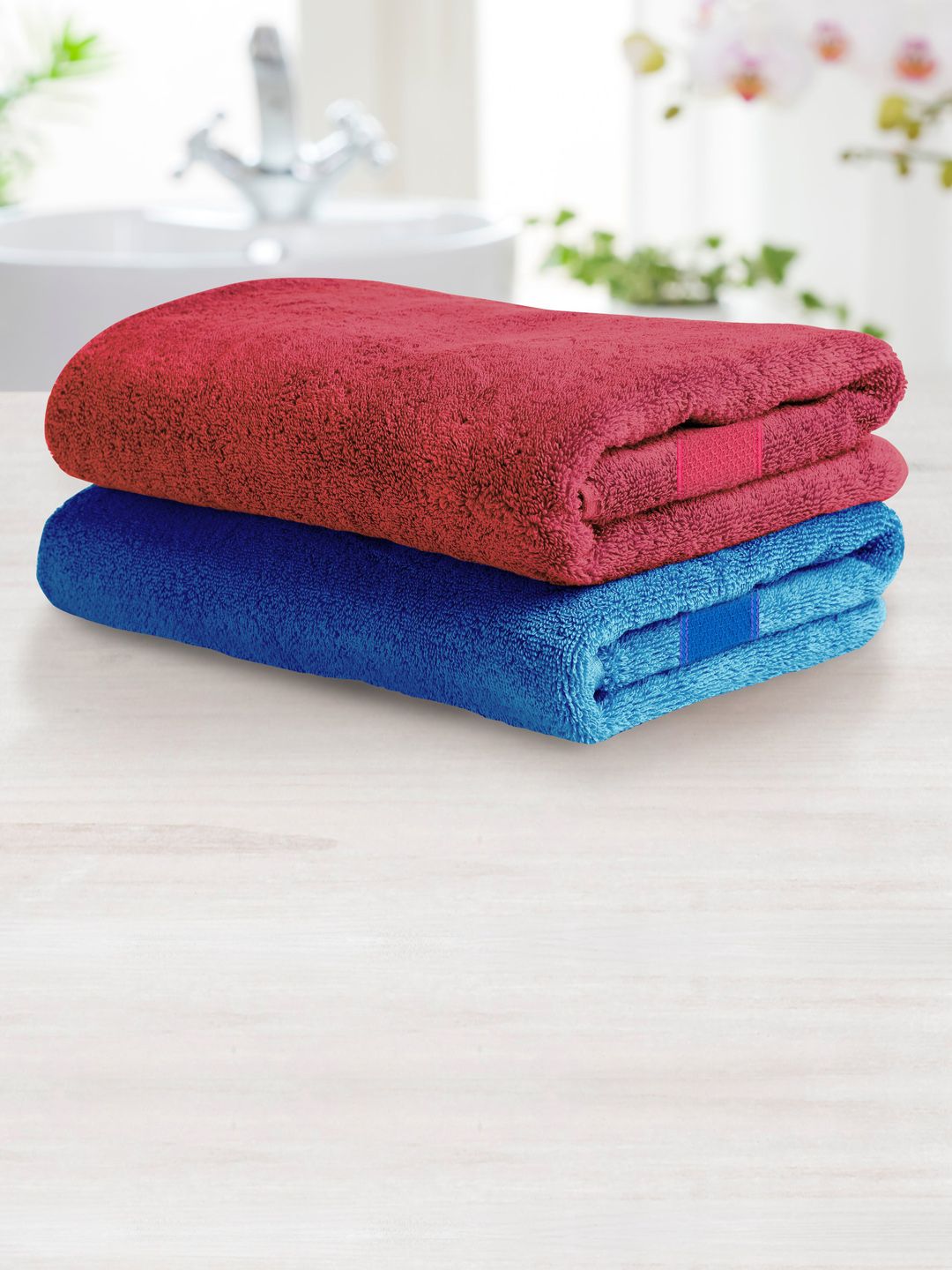 Athome by Nilkamal Unisex Set of 2 Pink & Blue Solid 370 GSM Cotton Bath Towels Price in India