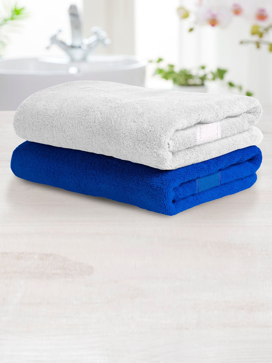 Athome by Nilkamal Unisex Set of 2 Blue & White Solid 370 GSM Cotton Bath Towels Price in India
