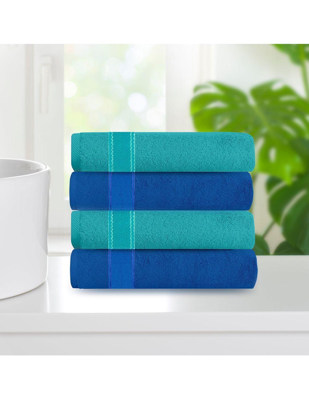 Athome by Nilkamal Pack Of 4 Blue & Irish Blue Solid Cotton 370 GSM Hand Towels Price in India