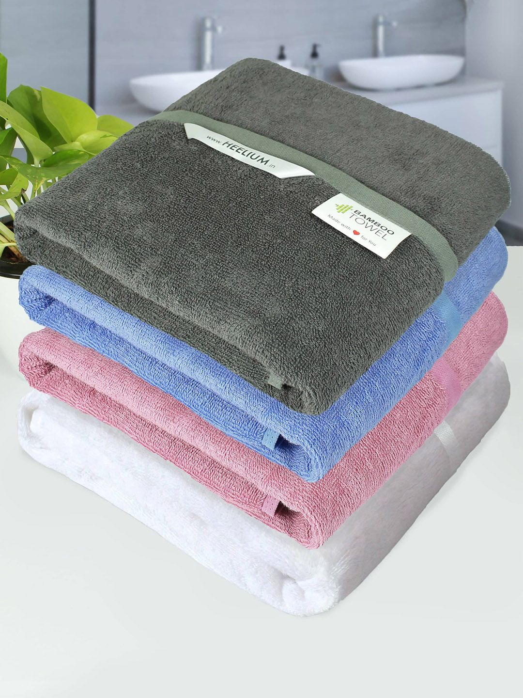 Heelium Set Of 4 Pink & Blue Solid 400 GSM Bath Towels Price in India