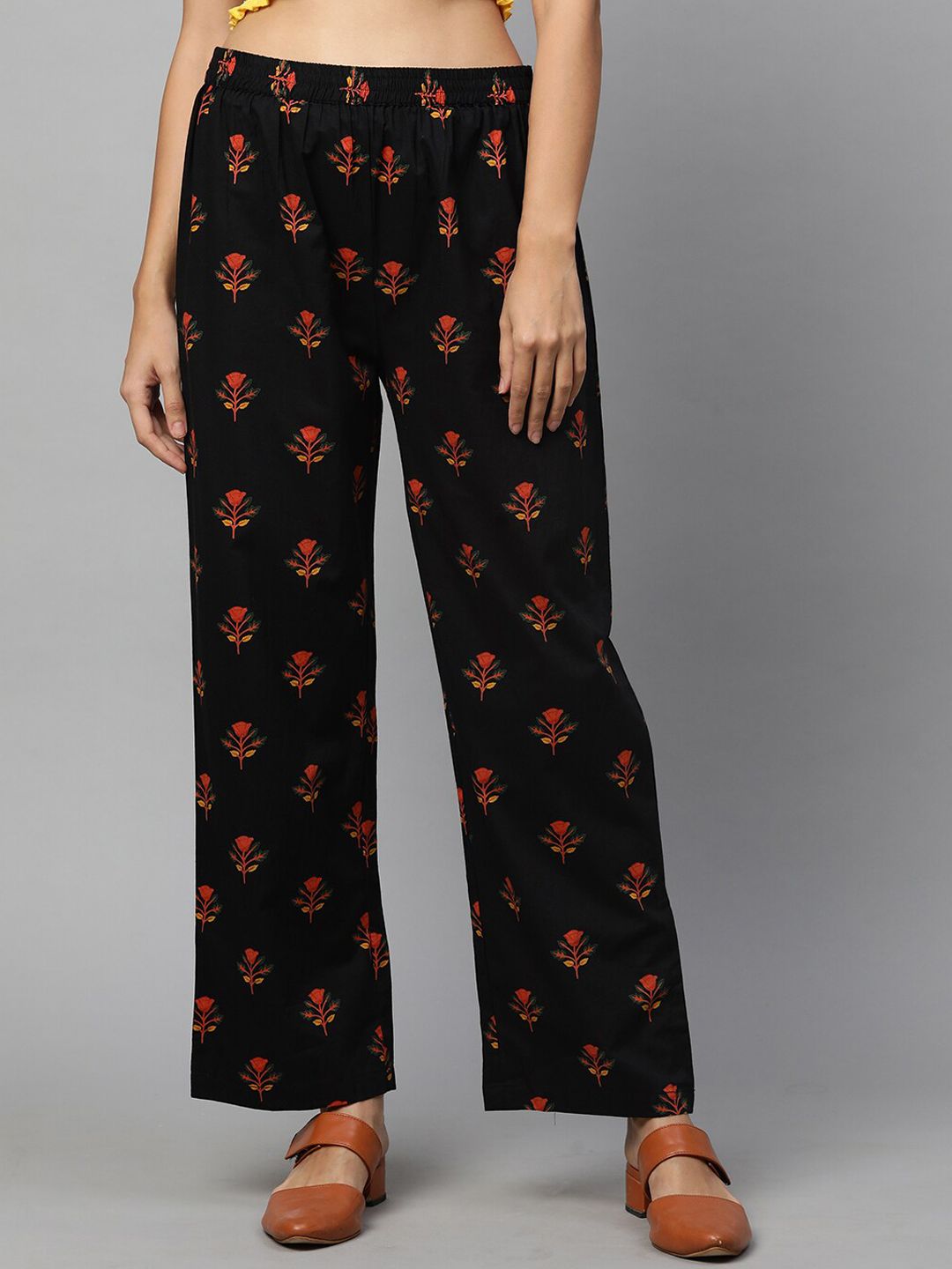 FASHOR Women Black Floral Printed Comfort Trousers Price in India