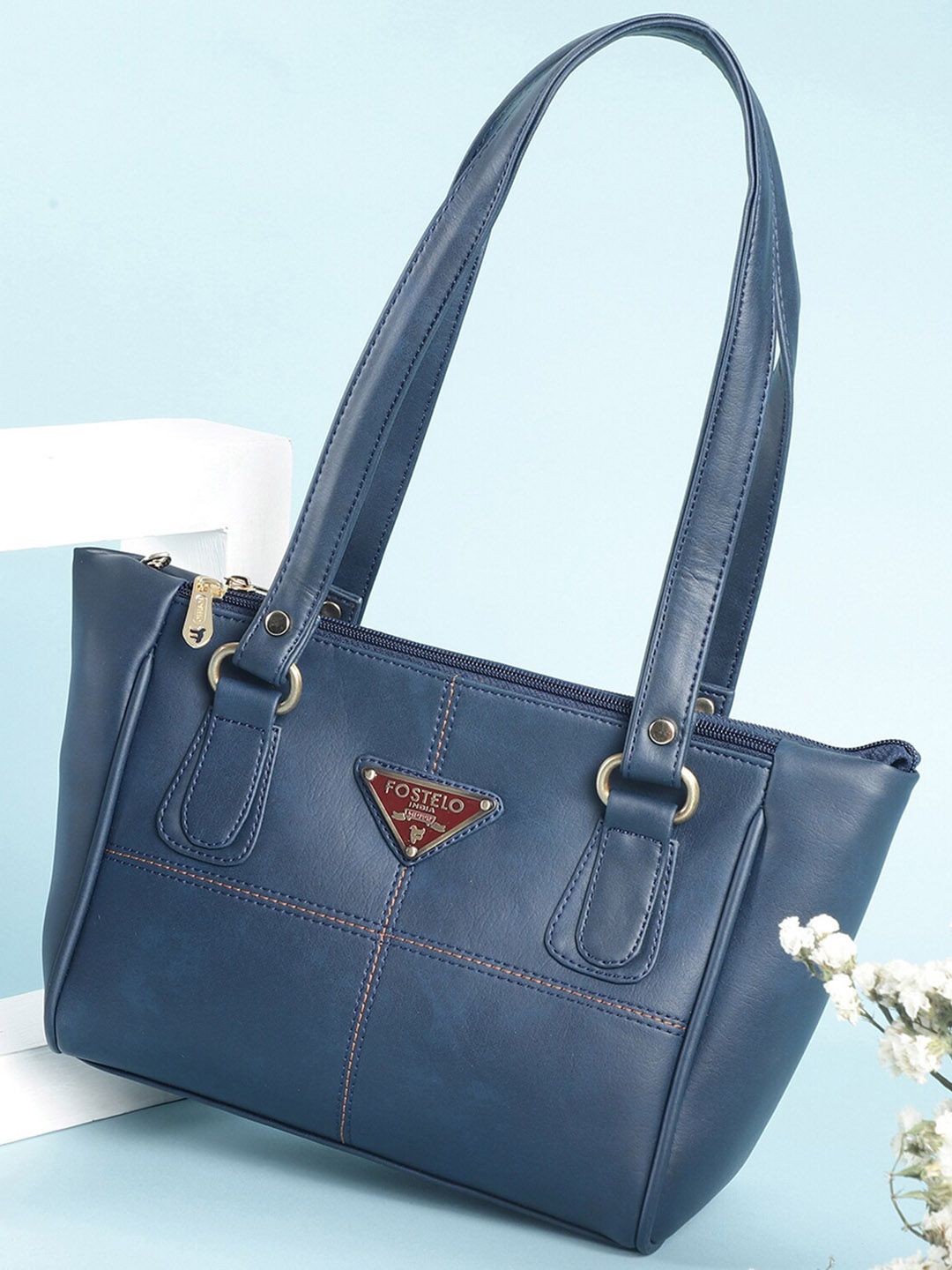 Fostelo Blue PU Structured Handheld Bag with Tasselled Price in India