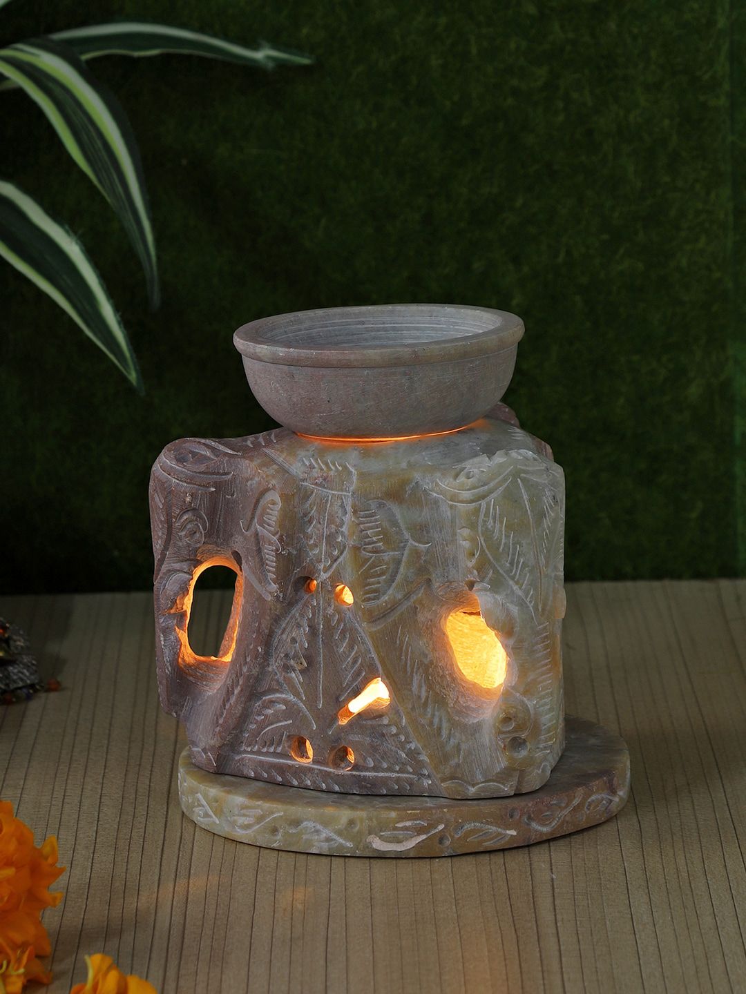 Aapno Rajasthan Cream Coloured Elephant Shaped Tealight Holder With Aroma Oil Diffusers Price in India