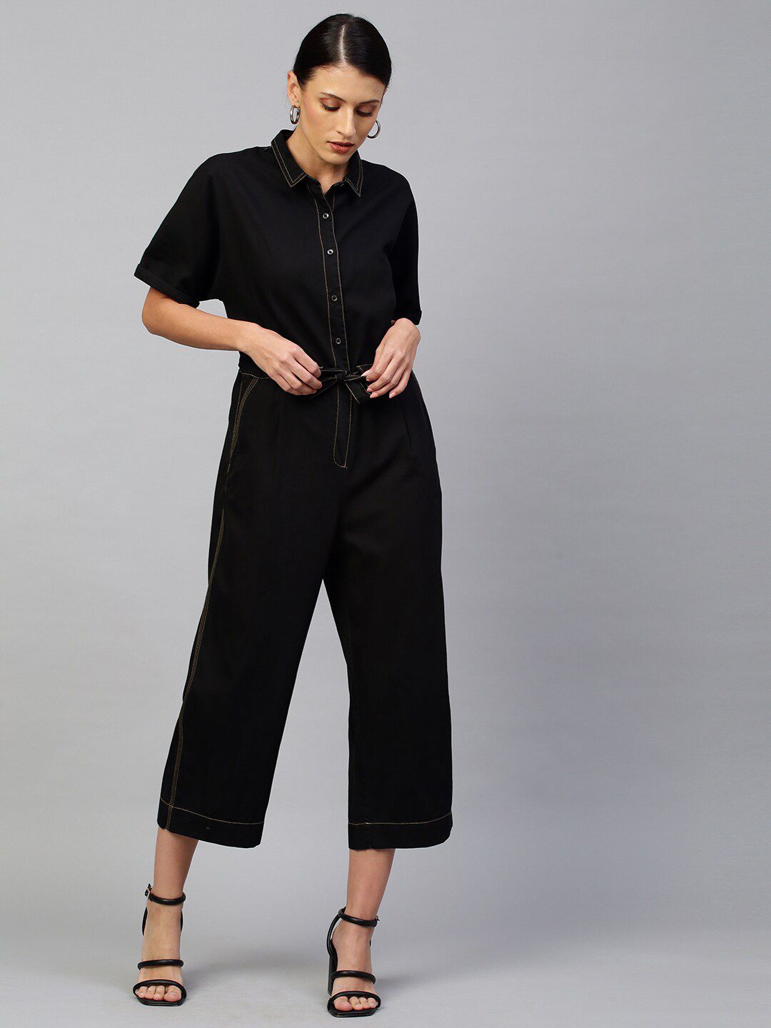 Chemistry Women Black Solid Denim Jumpsuit with Contract Stitches Price in India
