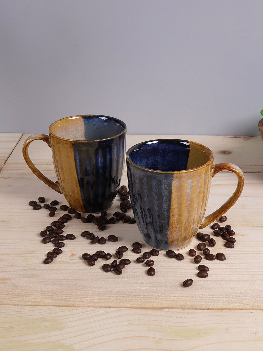 Homesake Yellow & Navy Blue Navy Blue Navy Blue Handcrafted Solid Ceramic Glossy Mugs Set of Cups and Mugs Price in India