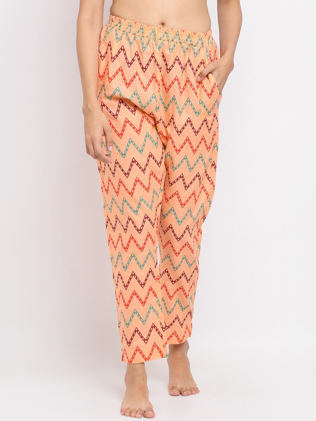 NEUDIS Women Peach-Coloured & Red Printed Cotton Lounge Pants Price in India