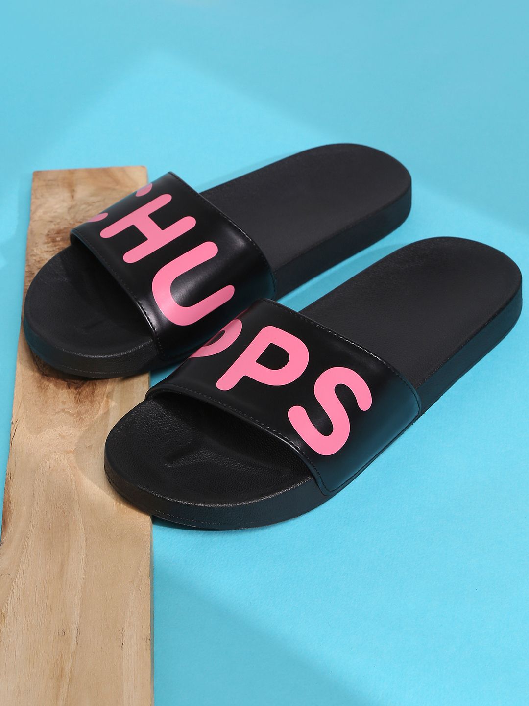 CHUPPS Women Black & Pink Printed Rubber Sliders Price in India