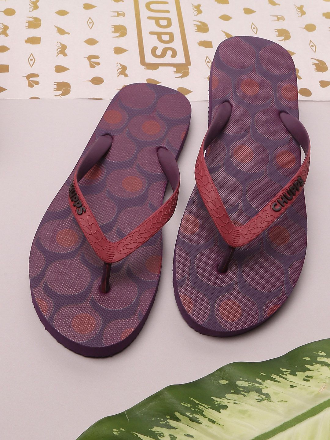 CHUPPS Women Purple & Orange Printed Rubber Thong Flip-Flops Price in India