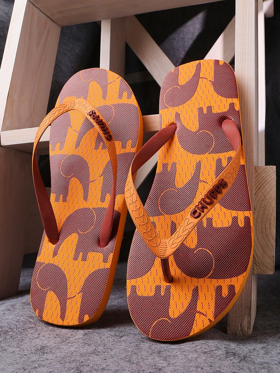 CHUPPS Women Orange & Purple Printed Rubber Thong Flip-Flops Price in India