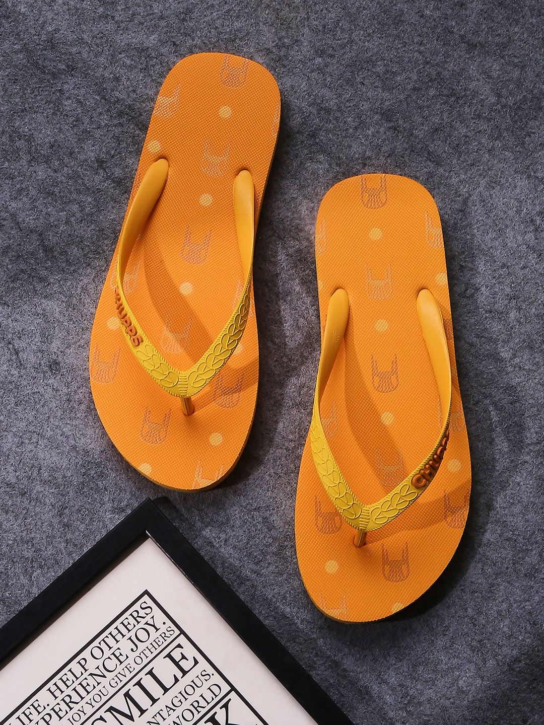 CHUPPS Women Orange Printed Rubber Thong Flip-Flops Price in India