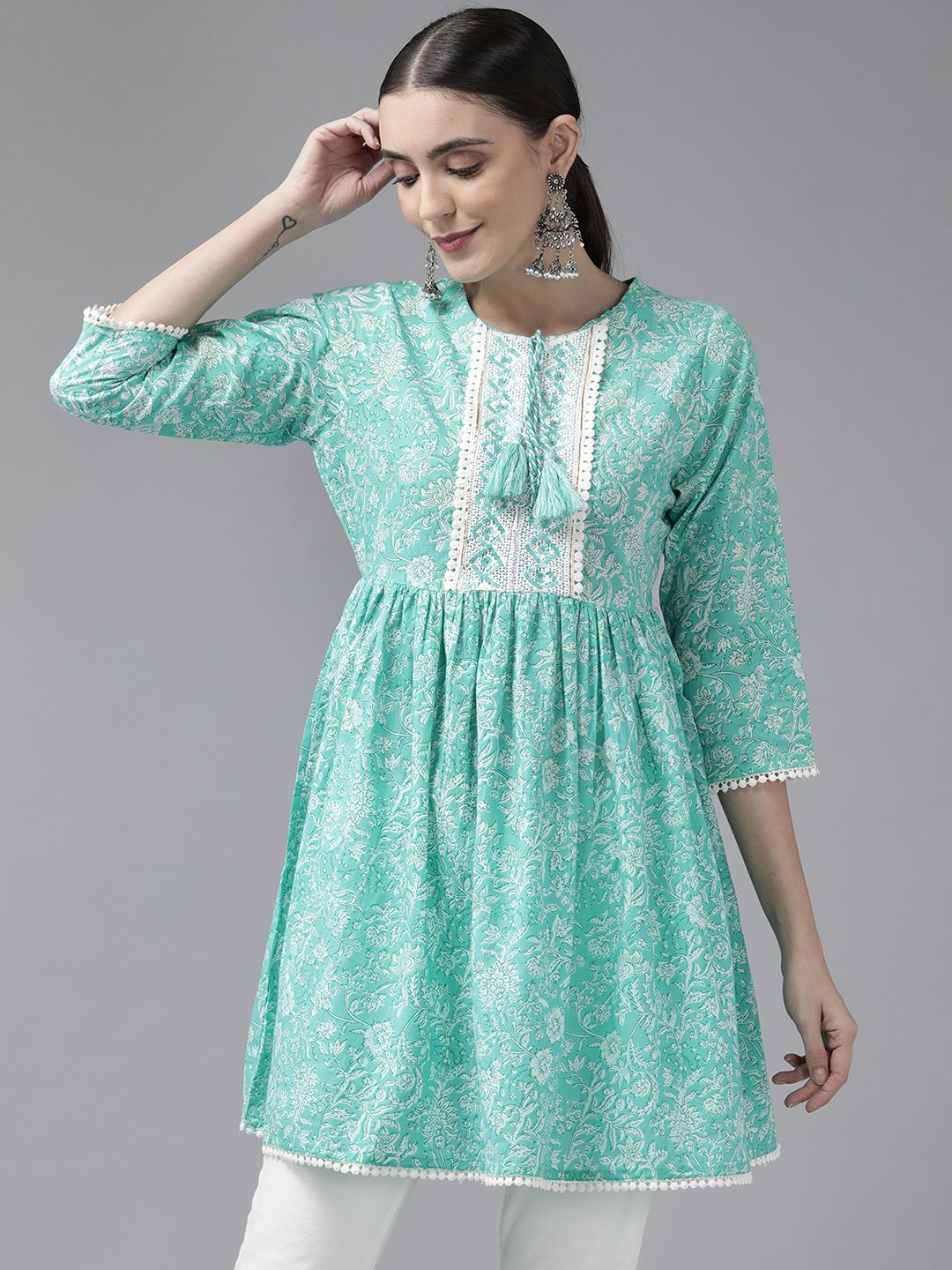 Amirah s Green & White Printed Tunic with Tie-up Neck Price in India