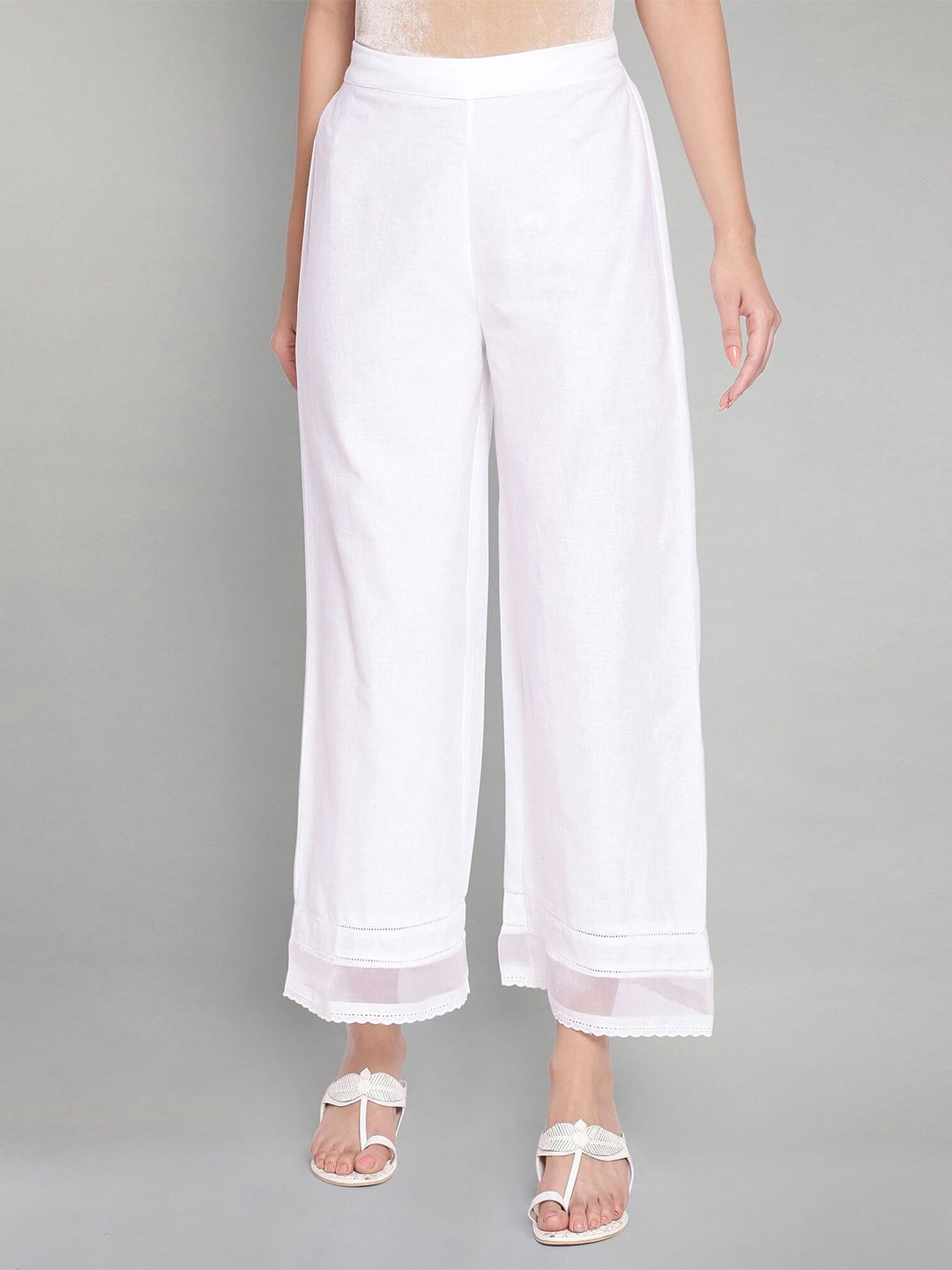 W Women White Solid Palazzos Price in India