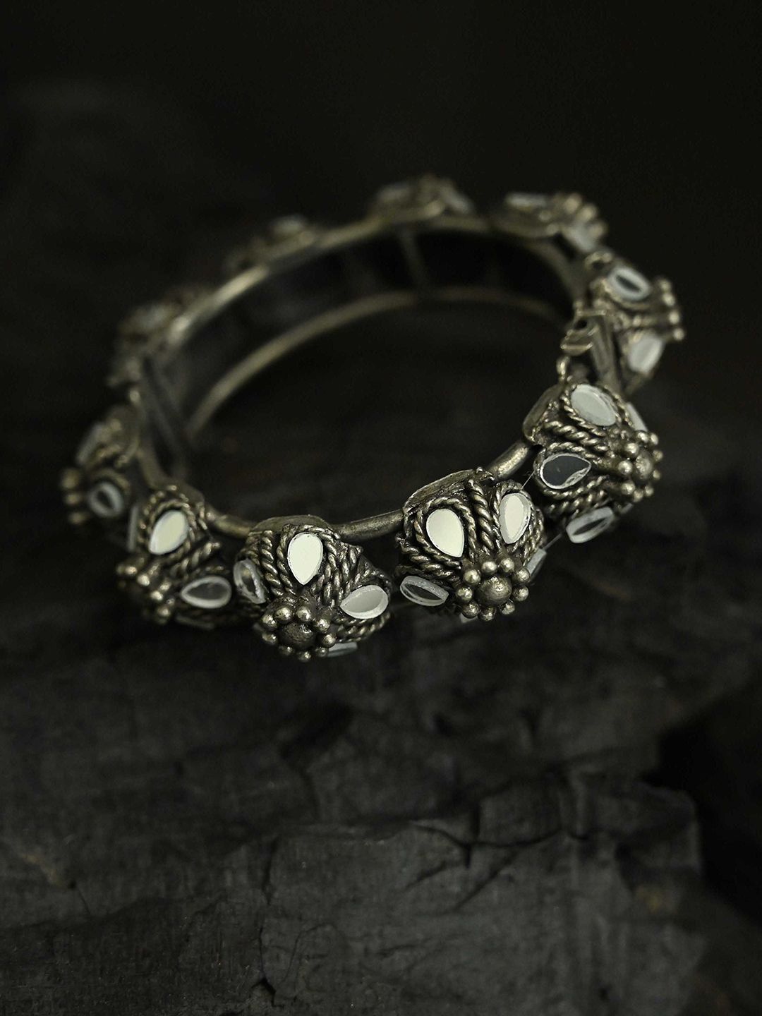 justpeachy Women Silver-Toned & White Oxidised Silver-Plated Bangle-Style Bracelet Price in India