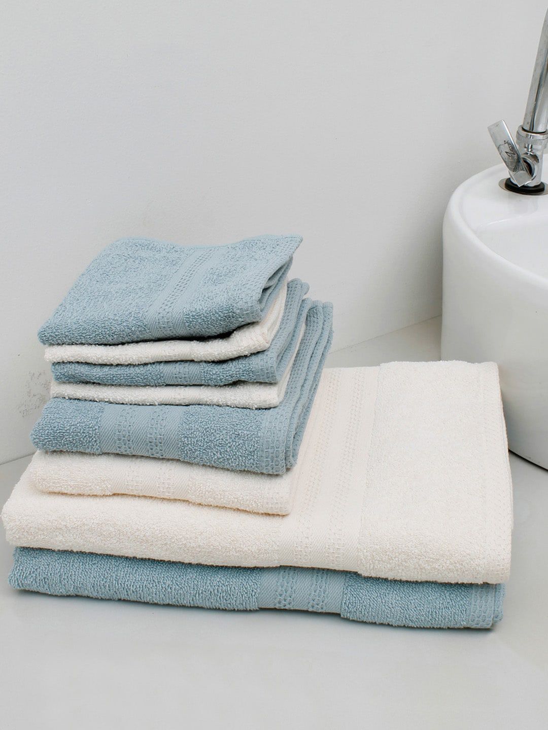 AVI Living Set of 8 Cream & Blue Solid Pure Cotton 400 GSM Towel Set Price in India