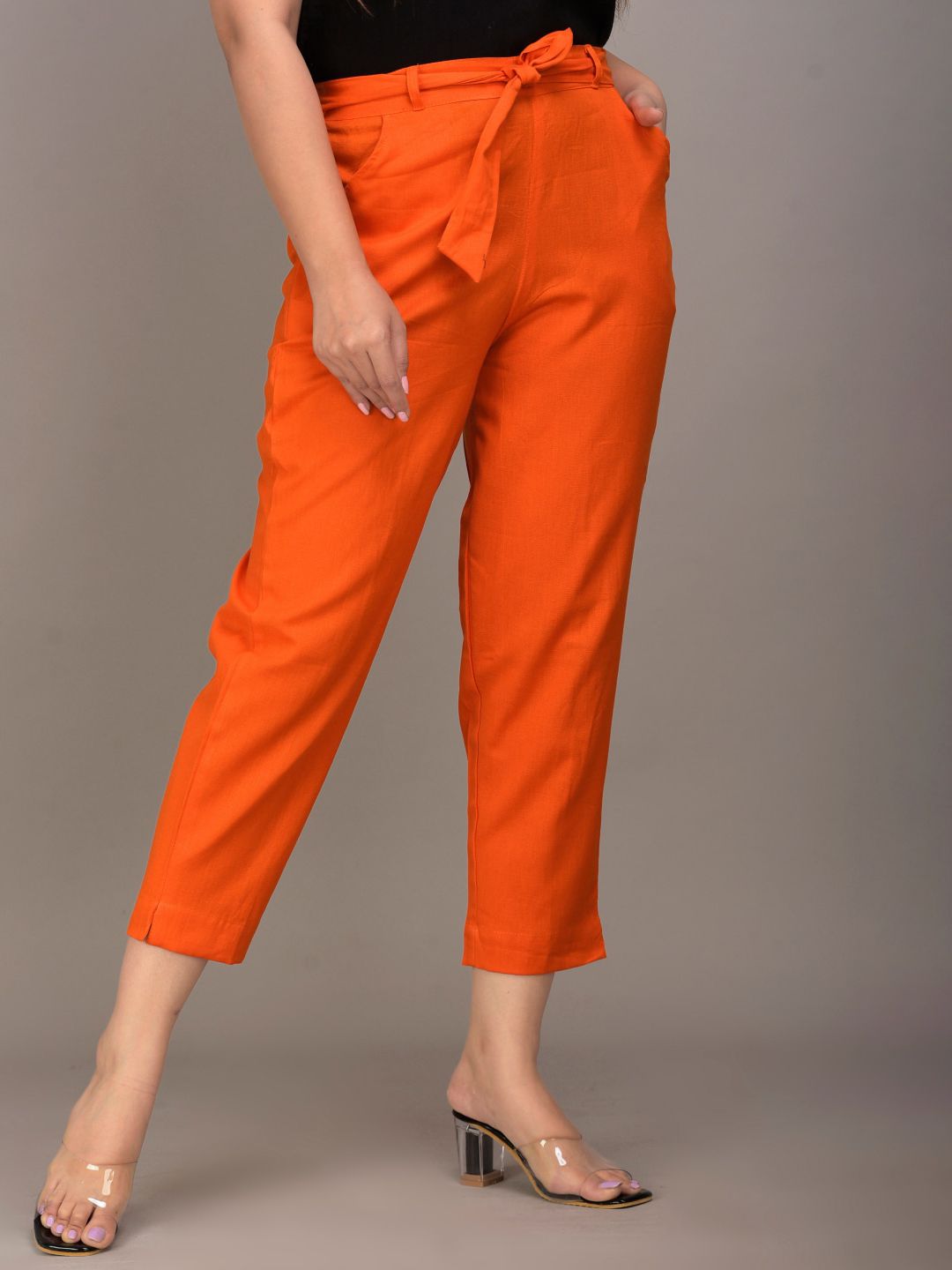 IQRAAR Women Orange Slim Fit Trousers Price in India