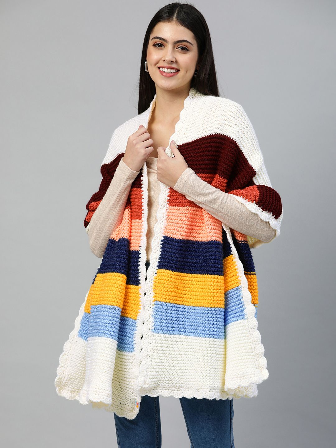 Magic Needles Women White & Navy Blue Striped Longline Handmade Poncho Price in India