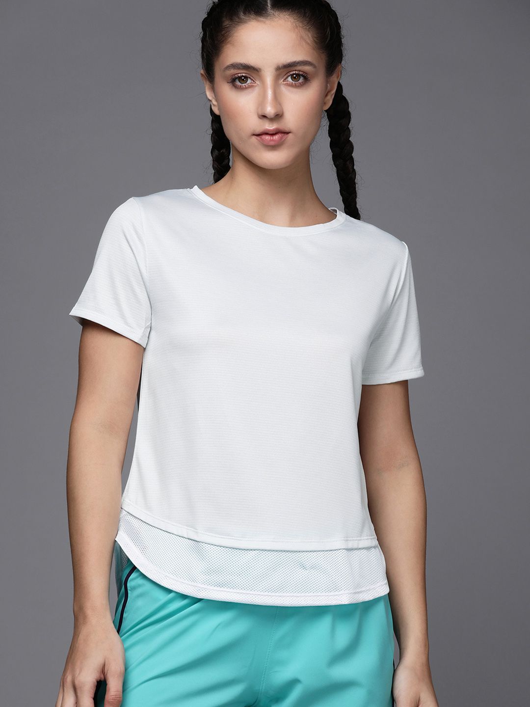 UNDER ARMOUR Women White Solid Tech Vent Loose T-shirt Price in India