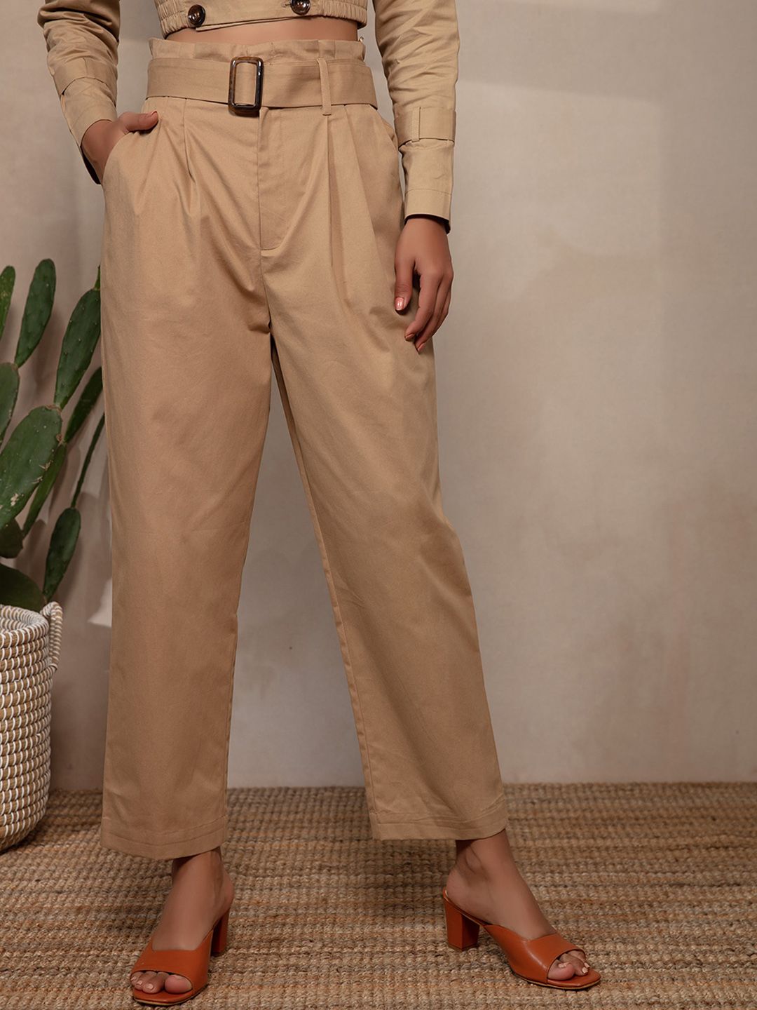 20Dresses Women Beige Relaxed Peg Trousers Price in India