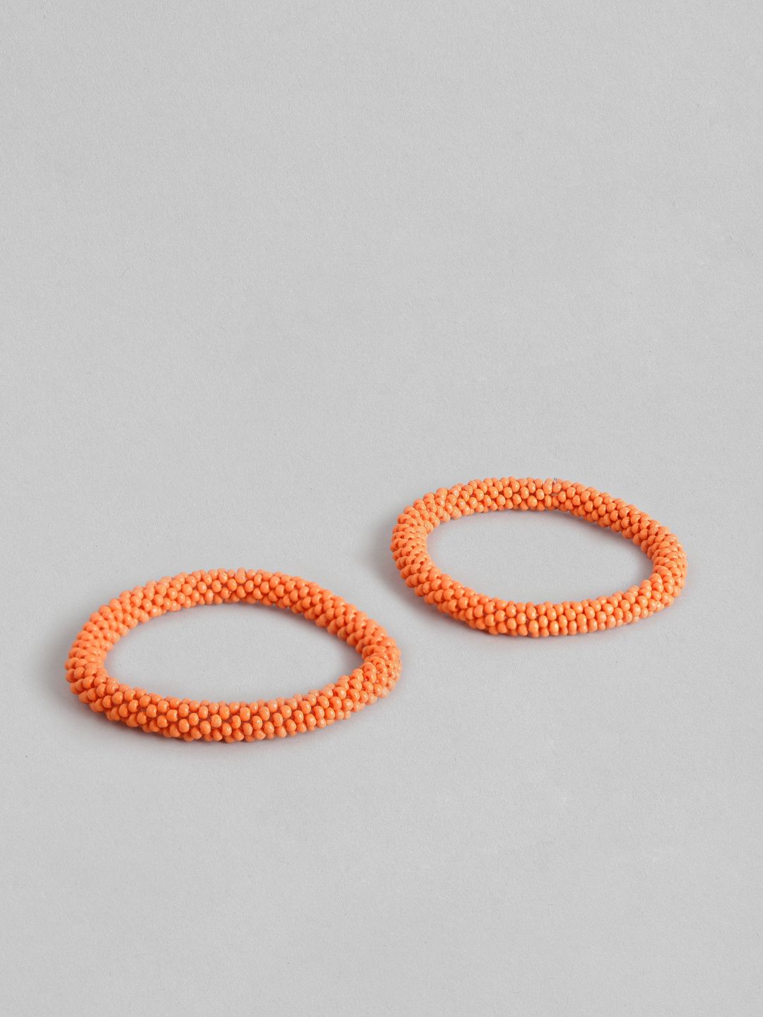 RICHEERA Women Orange Elasticated Bracelet Price in India