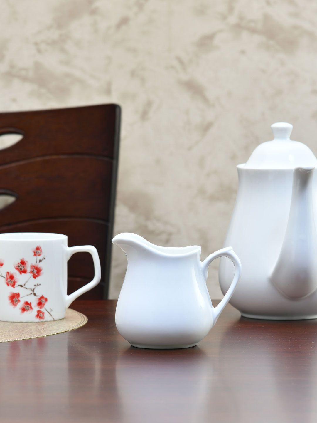 Athome by Nilkamal White Solid Ceramic Matte Creamer Price in India