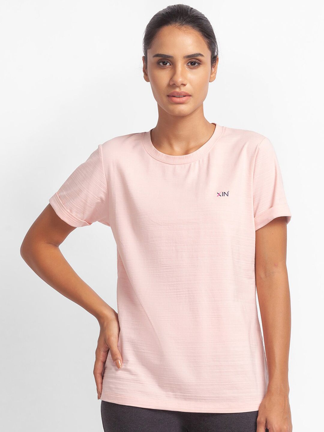 XIN Women Peach-Coloured Solid Sports T-shirt Price in India