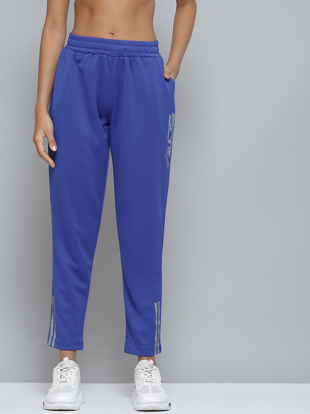 Alcis Women Blue Solid Track Pants Price in India